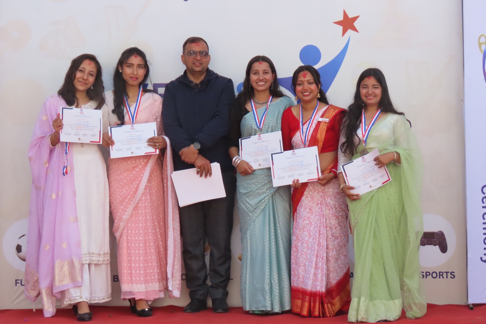 A group of certificate recipients at the Sports Week awards ceremony